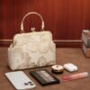 Women's Elegant Pearl Handle Clutch Bag - Floral